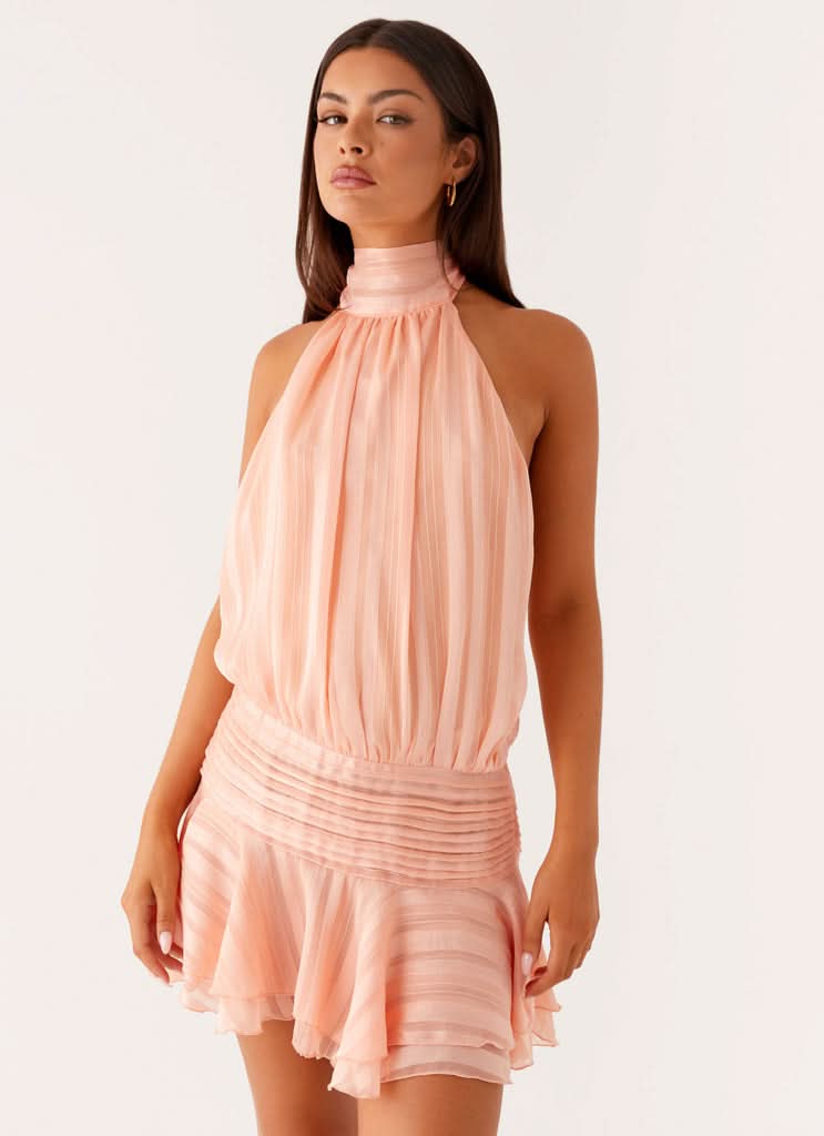 Women’s halter pleated mini dress by Harrow, elegant cocktail dress with a sleek design perfect for parties.