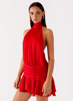 Harrow Aldora elegant pleated mini dress for women, halter style, suitable for cocktail parties, with a fitted waist and stylish design.