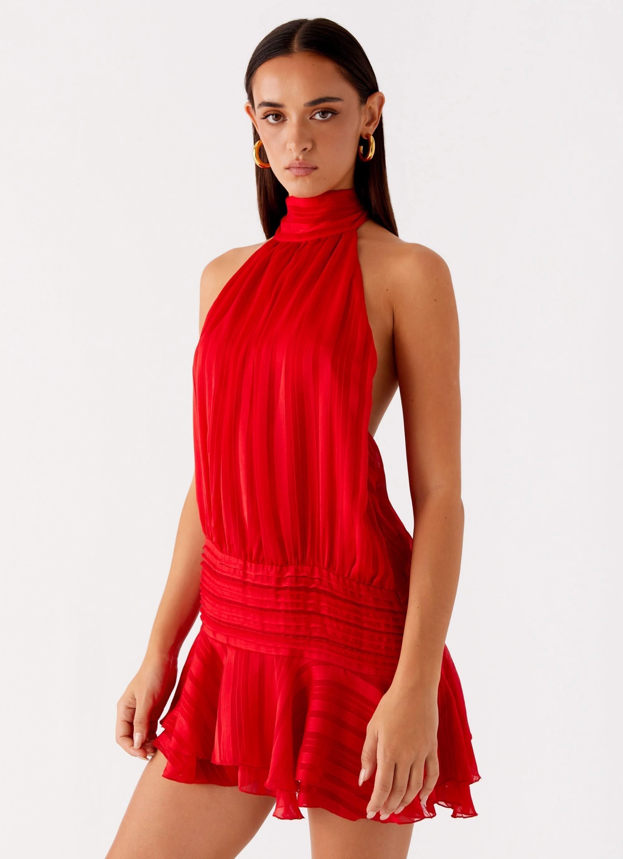 Harrow Aldora elegant pleated mini dress for women, halter style, suitable for cocktail parties, with a fitted waist and stylish design.