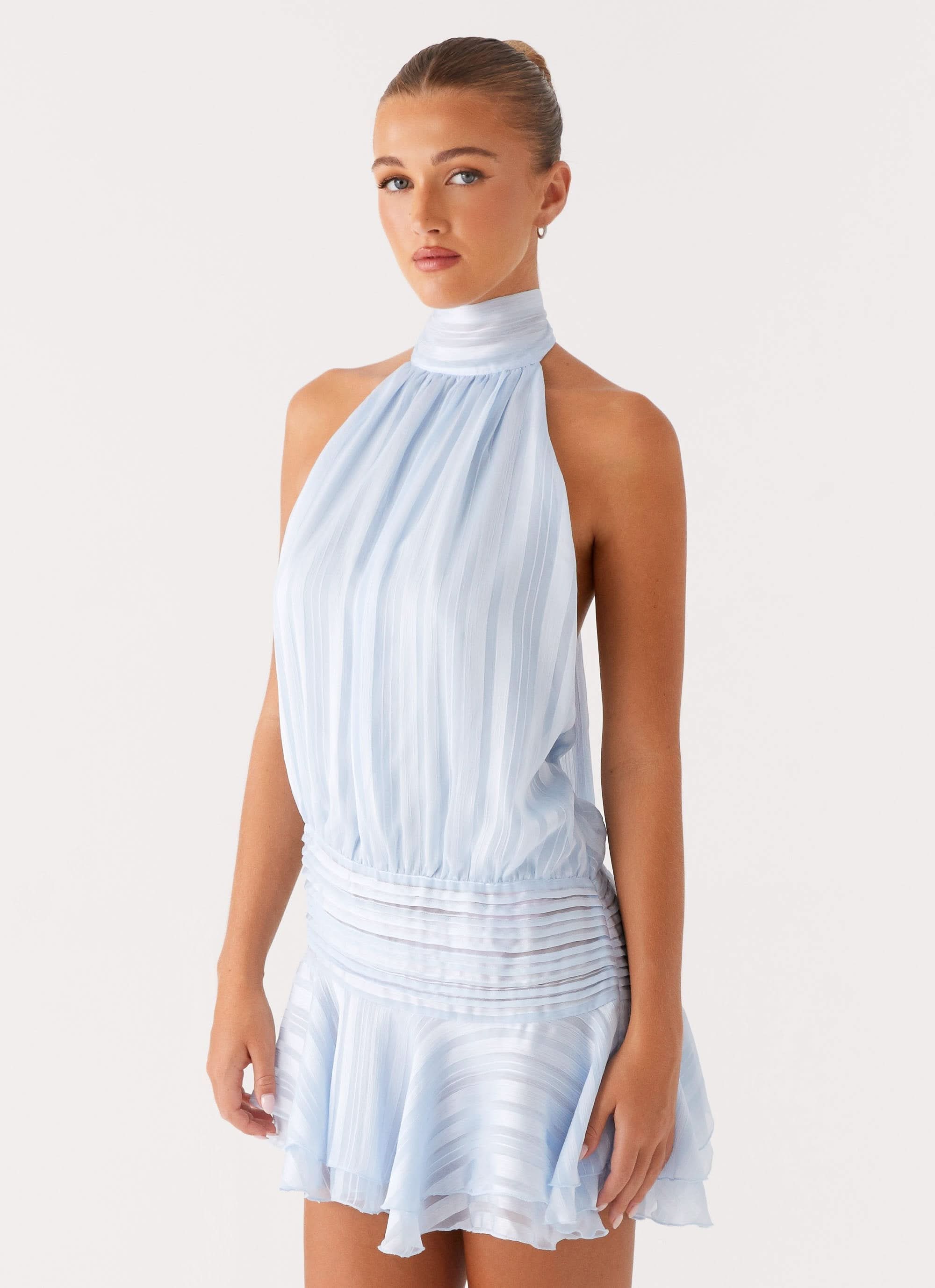 Women’s elegant halter pleated mini dress by Harrow, perfect for cocktail parties, featuring a stylish design and sophisticated fit.