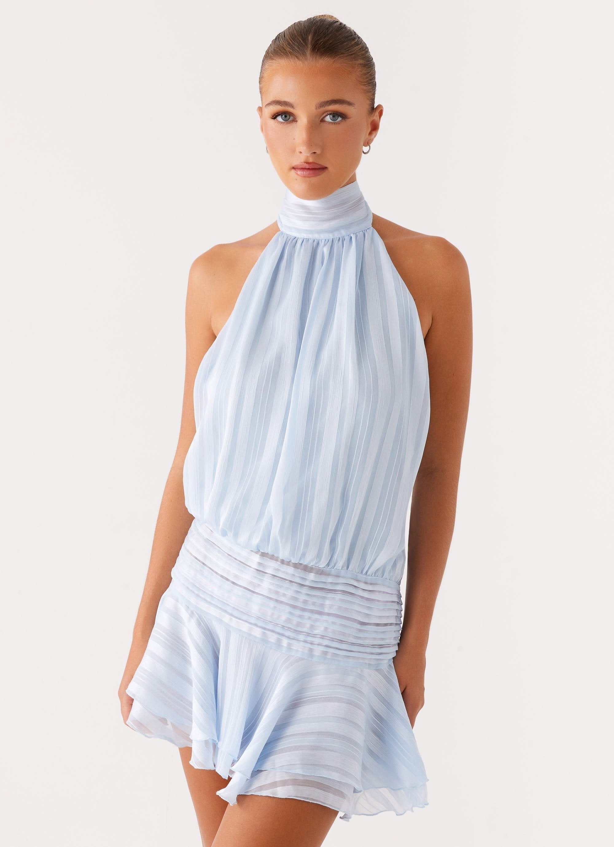 Harrow Aldora elegant pleated halter mini dress for women, perfect for cocktail parties, showcasing a stylish and sophisticated look.