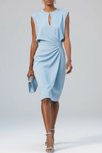 Women wearing the Harrow Alina sleek ruched bodycon midi dress with a keyhole neckline, perfect for cocktail parties.