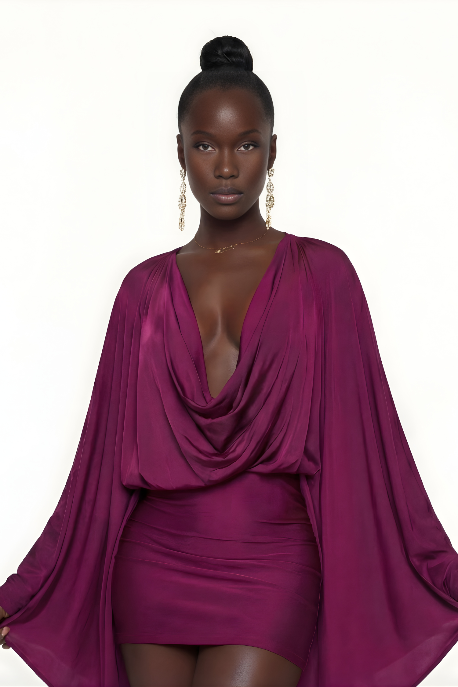 Elegant black mini dress by Harrow with draped cowl neck and batwing sleeves, perfect for cocktail parties.