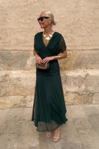 Women wearing the Harrow Amira floral maxi dress with off-shoulder design, suitable for cocktail parties, featuring a dreamy floral pattern.