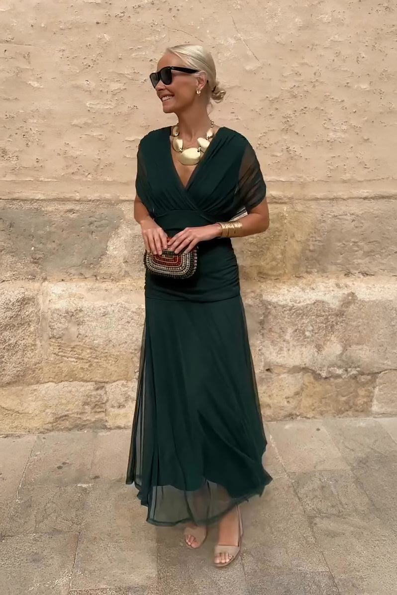 Women wearing the Harrow Amira floral maxi dress with off-shoulder design, suitable for cocktail parties, featuring a dreamy floral pattern.