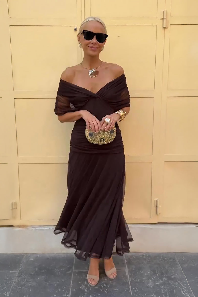 Women wearing Harrow Amira floral maxi dress with off-shoulder design, perfect for cocktail parties.