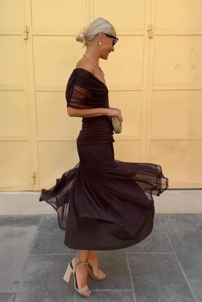 Women wearing the Harrow Amira dreamy floral off-shoulder maxi dress, perfect for cocktail parties, with vibrant floral patterns.