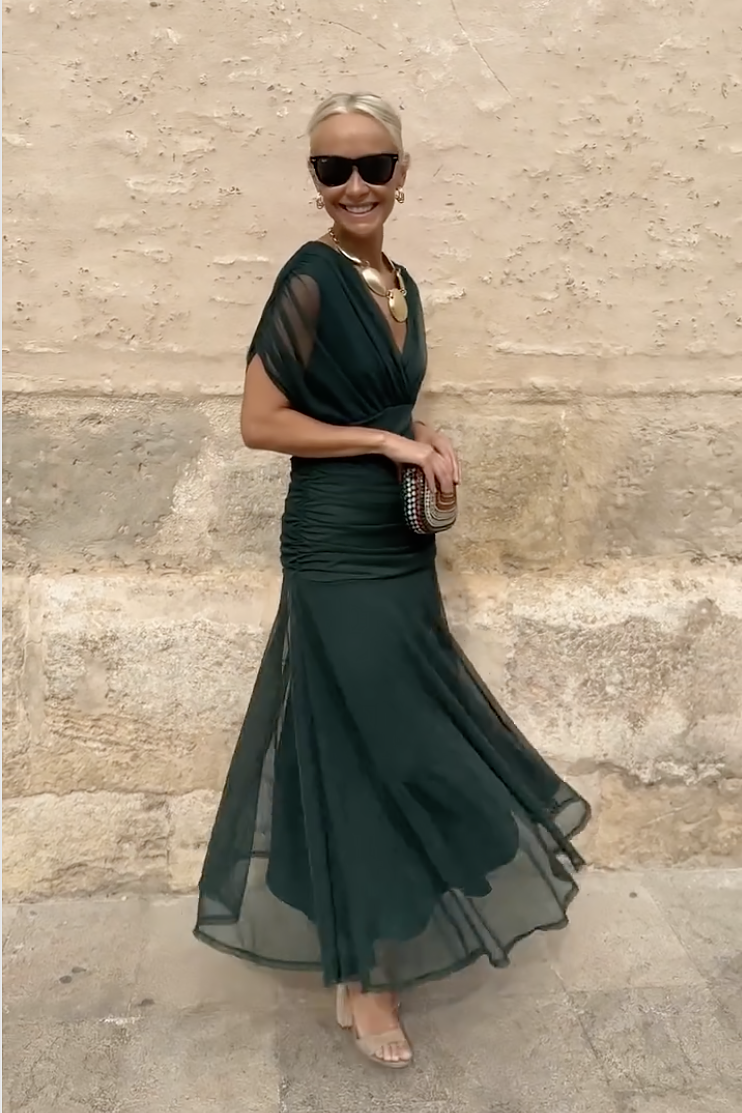 Women wearing the Harrow Amira floral maxi dress with off-shoulder design, perfect for cocktail parties and elegant events.