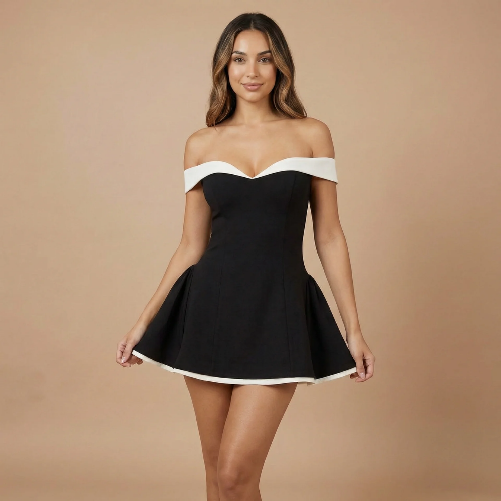 Women in a romantic off-shoulder mini dress by Harrow, featuring a sweetheart neckline, perfect for cocktail parties.