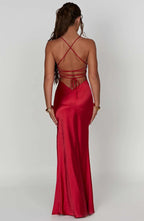 Women wearing the Harrow Annika luxe satin maxi dress with a V-neck, featuring a slit, perfect for cocktail parties.