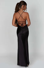 Women wearing Harrow Annika luxe satin maxi dress with V-neck, slit, perfect for cocktail parties.