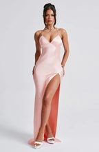 Women wearing Harrow Annika luxe satin maxi dress with V-neck and slit, ideal for cocktail parties.