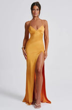 Women wearing Harrow Annika luxe satin maxi dress with V-neck, side slit, perfect for cocktail parties.