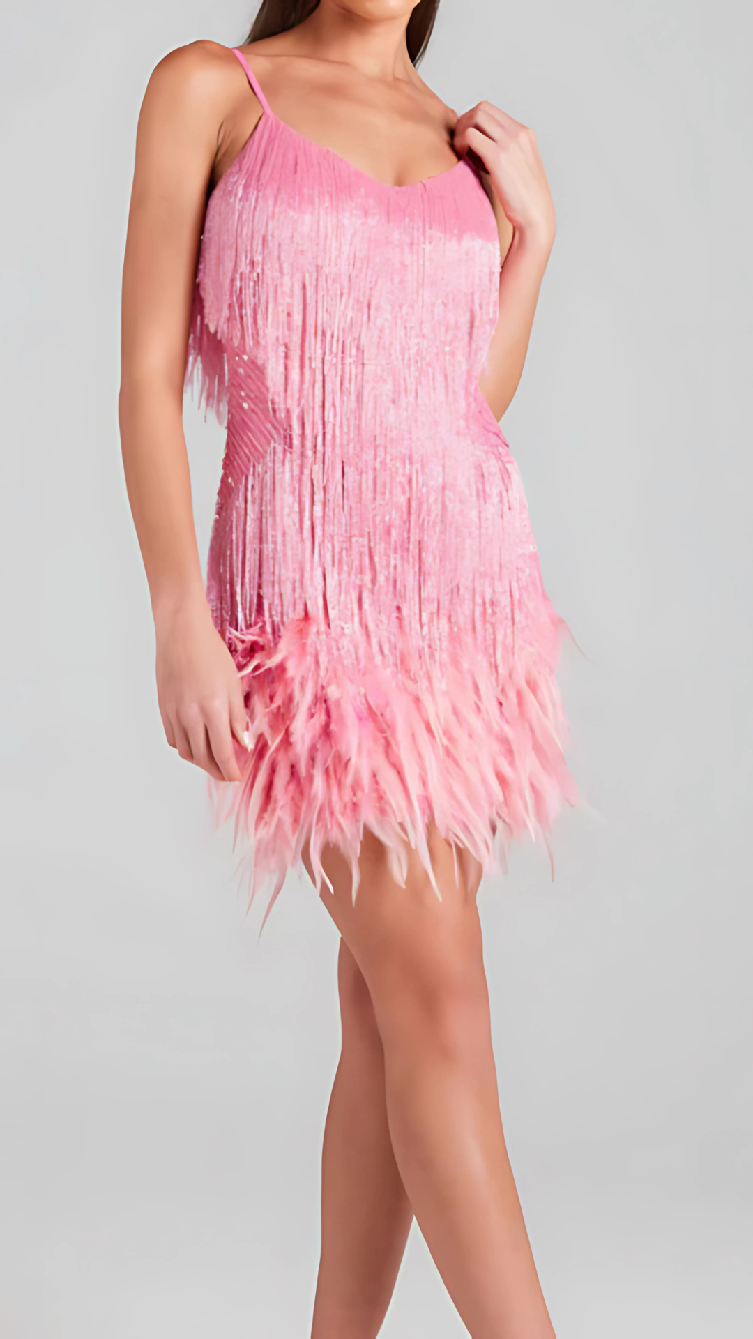 Women wearing the Harrow Antoinette glamorous sequin mini dress with fringe and V-neck, perfect for cocktail parties.