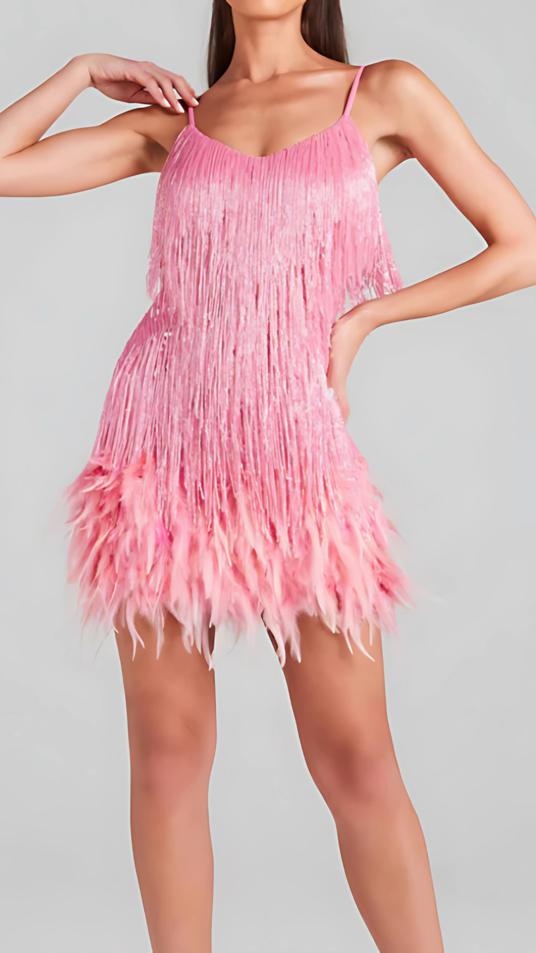 Women wearing the Harrow Antoinette sequin mini dress with fringe and V-neck, perfect for glamorous cocktail parties.