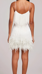 Women wearing the Harrow Antoinette glamorous sequin mini dress with fringe and V-neck, perfect for cocktail parties.