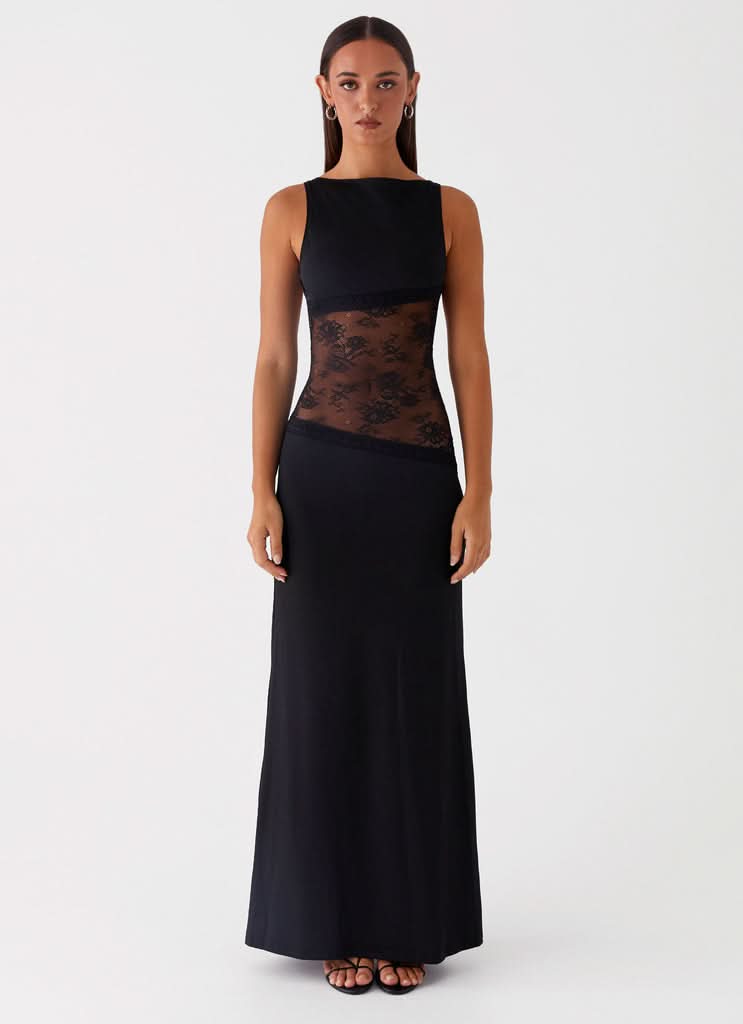 Women wearing Harrow Ariel lace maxi dress with cutout details, sleeveless design, perfect for cocktail parties.