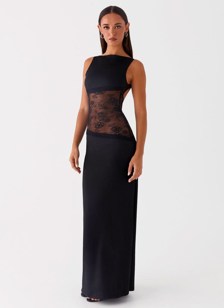 Women wearing Harrow Ariel elegant lace maxi dress with sleeveless design and cutout details for cocktail parties.