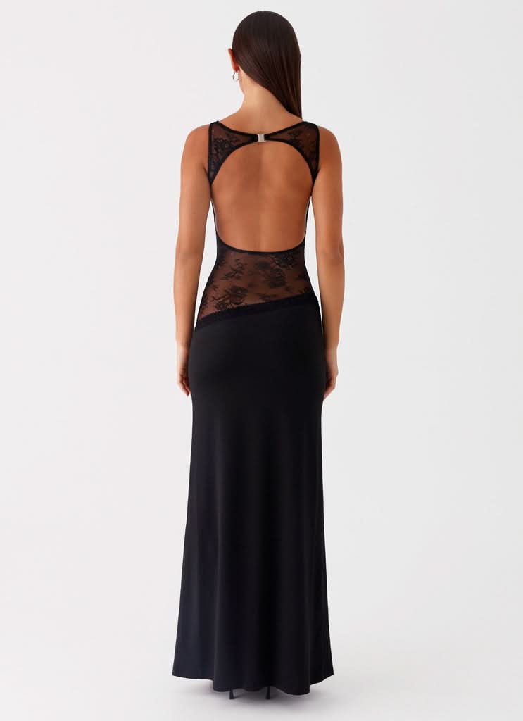 Women wearing the Harrow Ariel elegant lace maxi dress with sleeveless design and cutout details, perfect for cocktail parties.