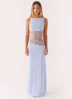 Women wearing black sleeveless lace maxi dress by Harrow, elegant cocktail dress with cutout details for special occasions