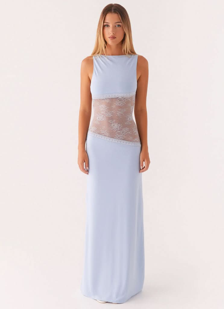 Women wearing black sleeveless lace maxi dress by Harrow, elegant cocktail dress with cutout details for special occasions