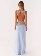 Women wearing Harrow Ariel lace maxi dress with cutout details, sleeveless design, perfect for cocktail parties.