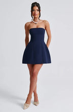 Women’s strapless bubble mini dress by Harrow featuring playful ruffles, perfect for cocktail parties.