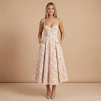Women wearing the Harrow Beatrice sweetheart midi dress with a fit-and-flare silhouette, perfect for cocktail parties.