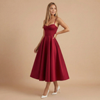 Women wearing Harrow Beatrice romantic sweetheart midi dress with fit and flare silhouette for cocktail parties