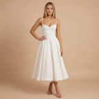 Women wearing Harrow Beatrice romantic sweetheart midi dress, fit and flare style for cocktail parties.