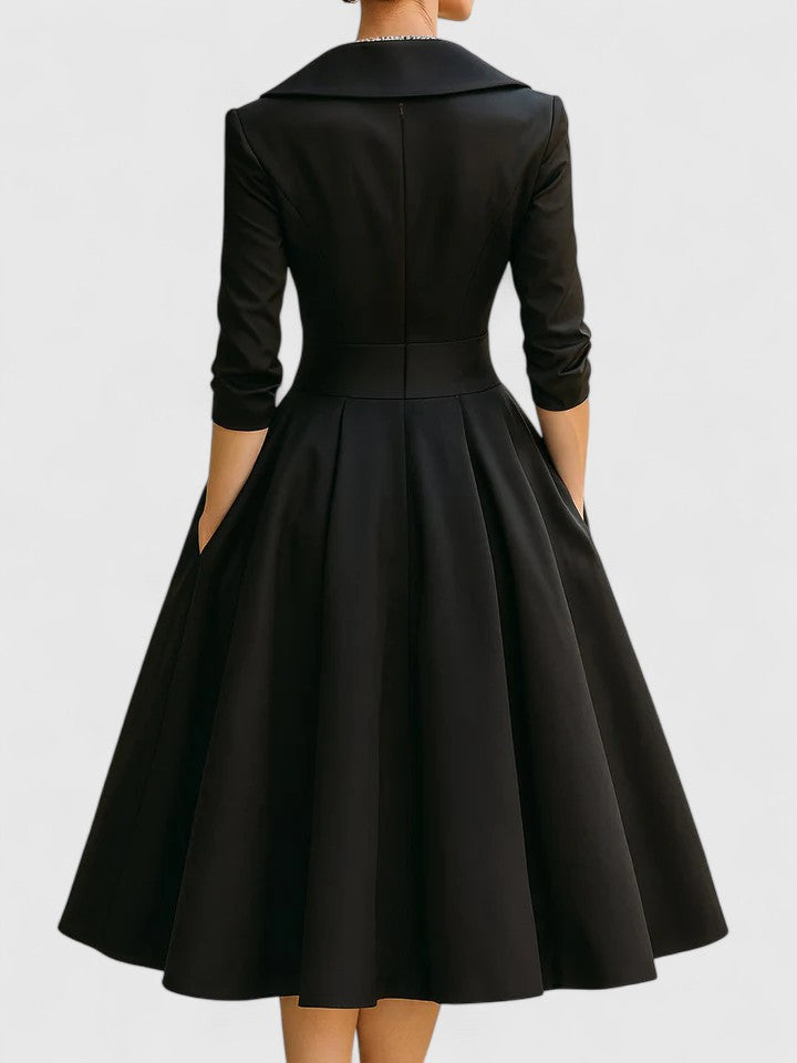 Women wearing Harrow Beatrix glamorous cocktail midi dress with V-neck, 3/4 sleeves, and practical pockets at a cocktail party.