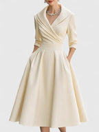 Elegant Beatrix cocktail midi dress by Harrow featuring a V-neck, 3/4 sleeves, pockets, perfect for glamorous parties.