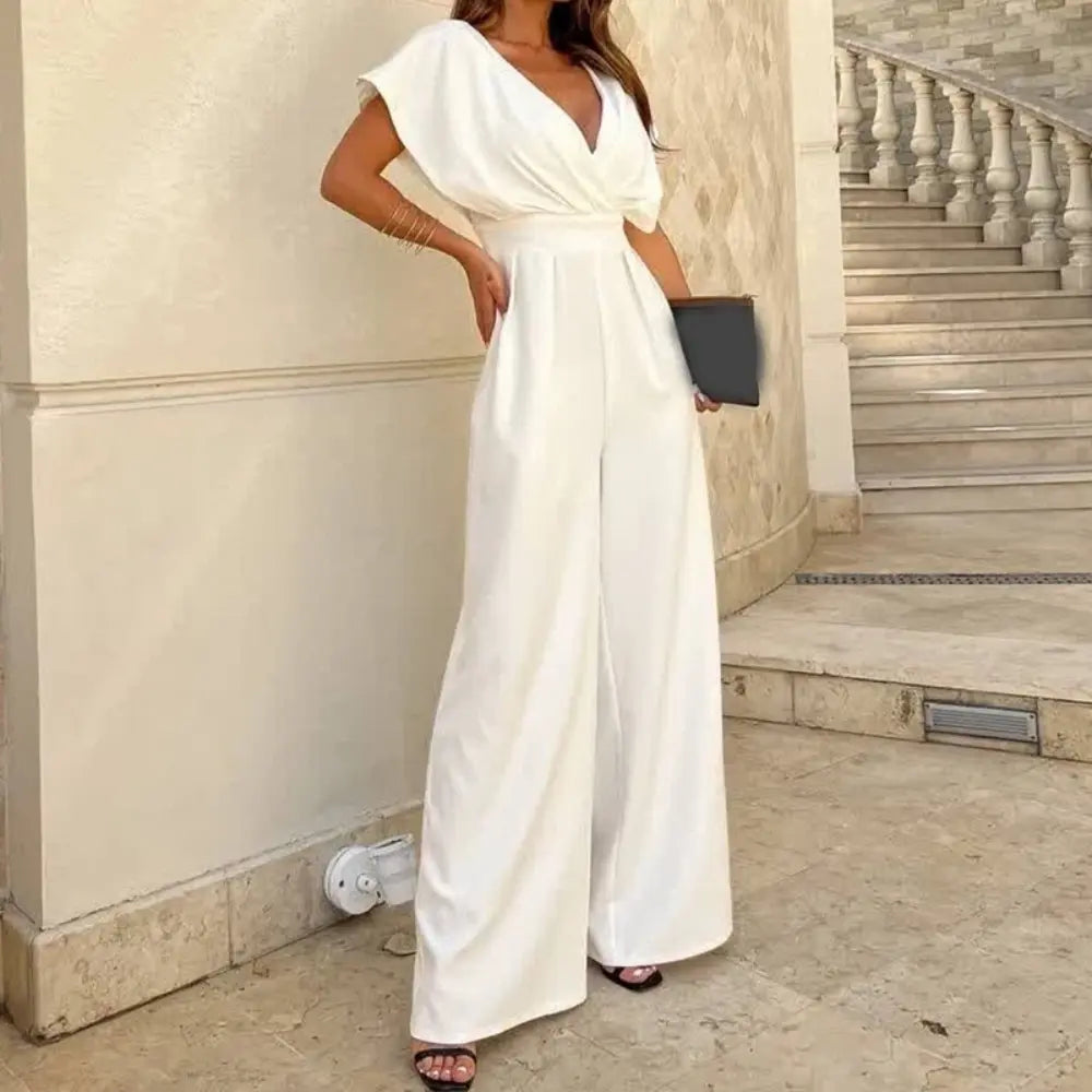Women wearing Harrow Bonnie wide-leg V-neck jumpsuit with flutter sleeves, stylish for cocktails and elegant occasions.