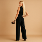 Women wearing Harrow Bree wrap V-neck wide-leg jumpsuit, featuring a flattering fit and elegant style for women.