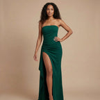 Harrow Calista sleek ruched strapless maxi dress with thigh slit, perfect for formal events, shown on a woman.