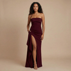 Harrow Calista sleek ruched strapless maxi dress with thigh slit, perfect for formal events, shown on a woman.