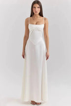 Women wearing the Harrow Celeste luxe satin maxi dress with square neckline, ideal for prom and formal events.