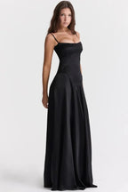 Women wearing the Harrow Celeste luxe satin maxi dress with square neckline, ideal for prom and formal events.