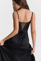 Women wearing the Harrow Celeste luxe satin maxi dress with a square neckline, ideal for prom and formal events.
