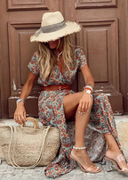 Women wearing the Harrow Celia dreamy boho maxi dress with a V-neck and waist belt, perfect for summer.