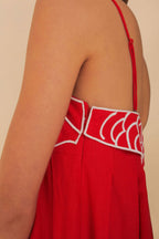 Women wearing Harrow Chiara fish print spaghetti strap maxi dress, lightweight summer dress with vibrant aquatic pattern.