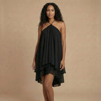 Women wearing the Cosima Effortless Halter Neck Mini Dress by Harrow, flowy summer dress with a stylish halter neckline.