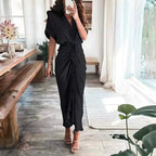 Women wearing the Harrow Delia collared V-neck midi dress, perfect for wedding guests, showcasing elegant fabric and stylish design.