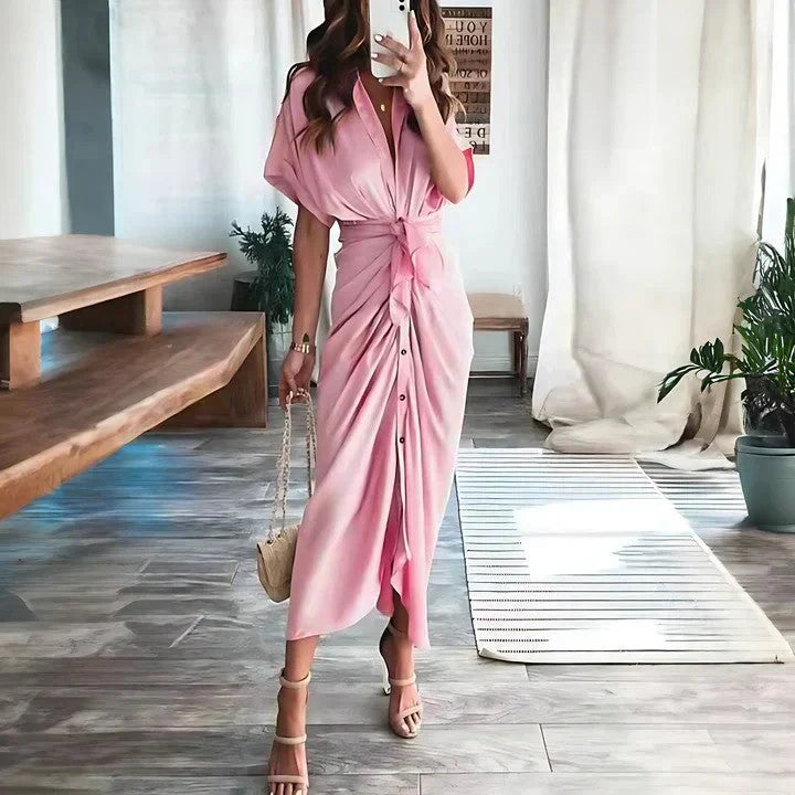 Women wearing the Harrow Delia collared V-neck midi dress, perfect for wedding guests, showcasing elegant fabric and stylish design.