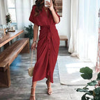 Harrow Delia wedding guest midi dress with a collared V-neck, sleeveless design, and elegant flowy fabric, perfect for formal occasions.