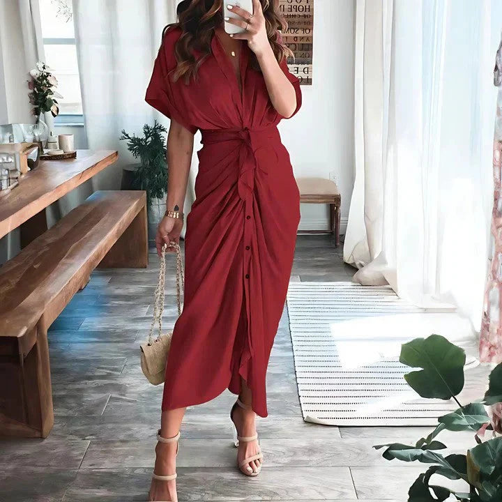 Harrow Delia wedding guest midi dress with a collared V-neck, sleeveless design, and elegant flowy fabric, perfect for formal occasions.
