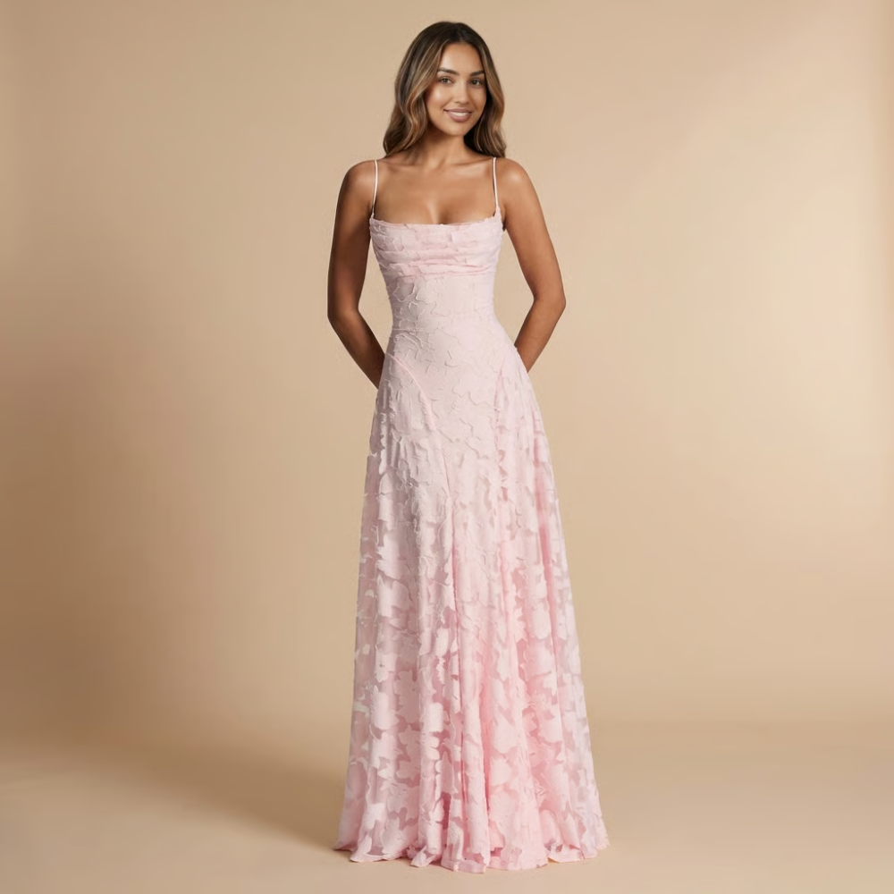 Elegant floral lace maxi dress for women, with spaghetti straps, designed by Harrow for wedding guests.