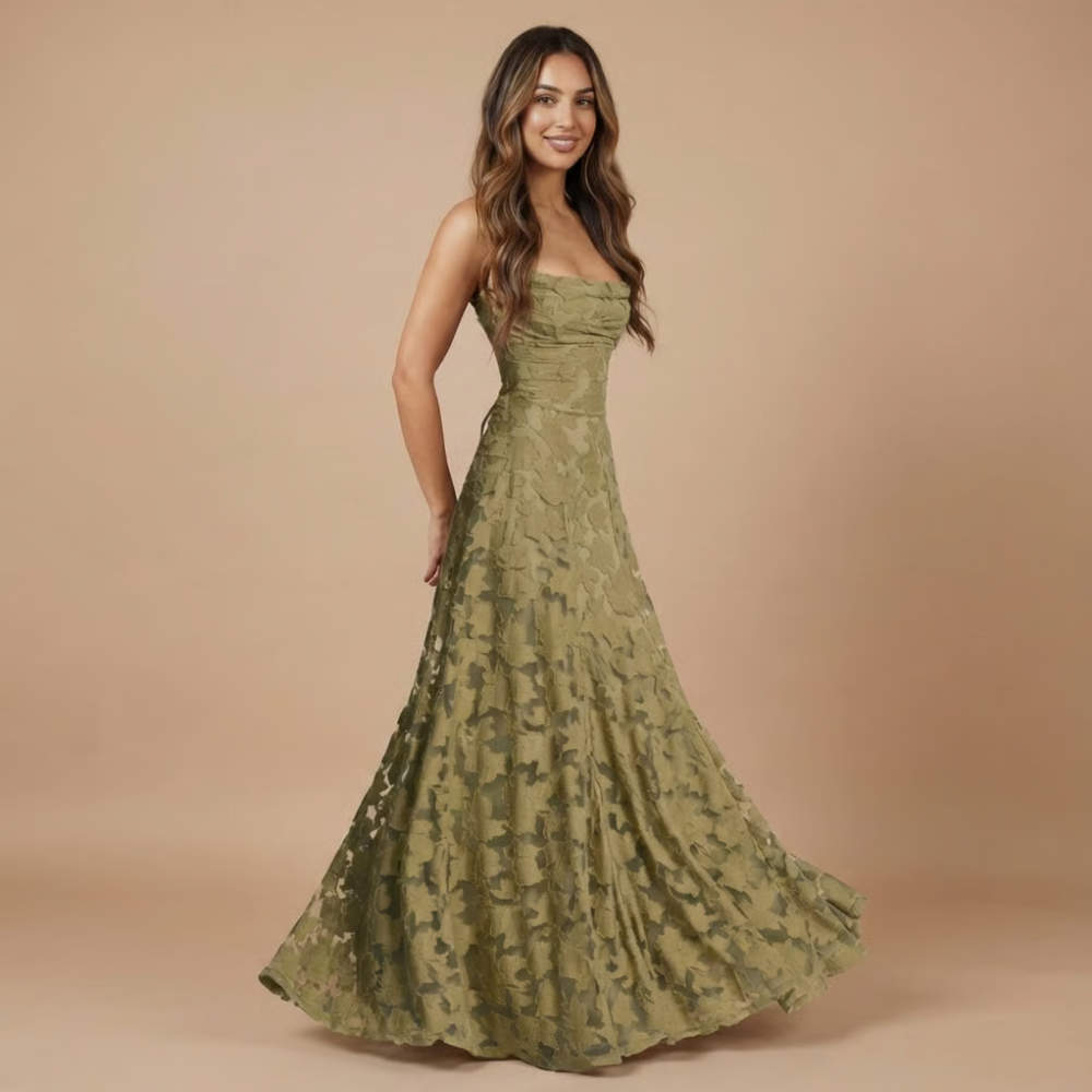 Elegant lace maxi dress for women, floral design, spaghetti straps, perfect for wedding guests, by Harrow.