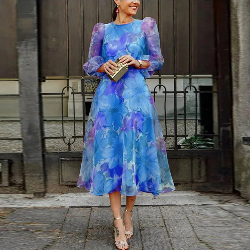 Harrow Elise floral midi dress for women, long sleeve wedding guest dress with a dreamy floral pattern and elegant fit.