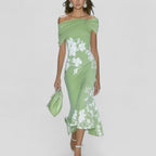 Women wearing the Harrow Eliza floral midi dress with off-shoulder design, perfect for wedding guests.